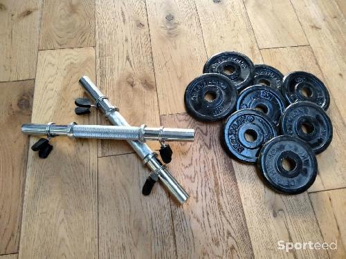 Barre courte de musculation avec disques