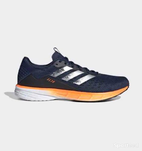 Chaussures ADIDAS SL20