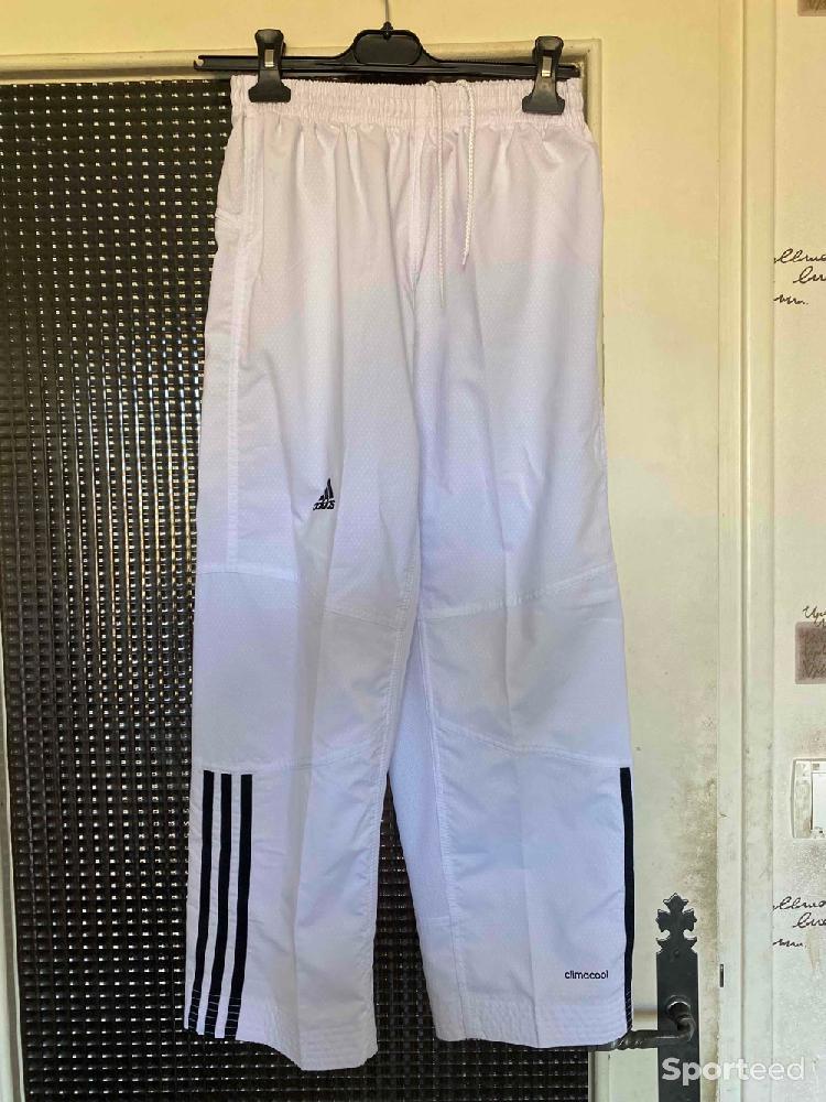 Karaté - Vend Pantalon de Taekwondo Adidas ADITF02 taille 150 cm - photo 1