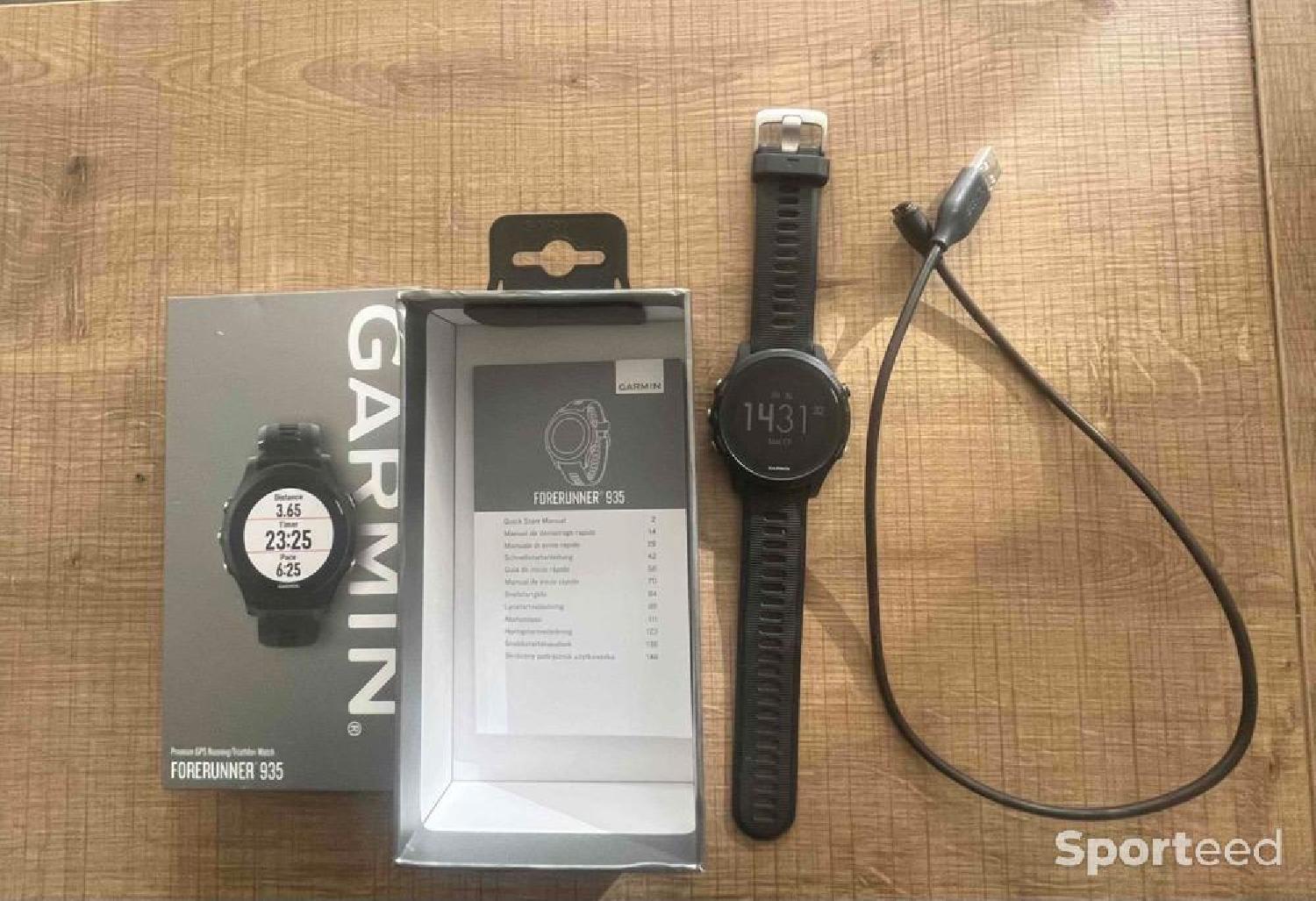 Montre GPS connectée Garmin 935 avec Cardio au poignet, 290 euros  d'occasion : Equipements