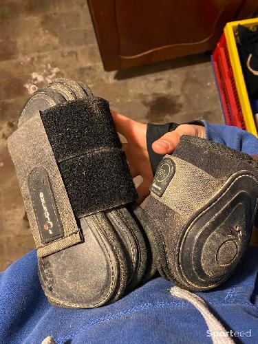 guêtres noires poney 