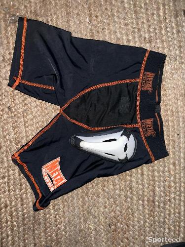 Short de boxe avec coquille
