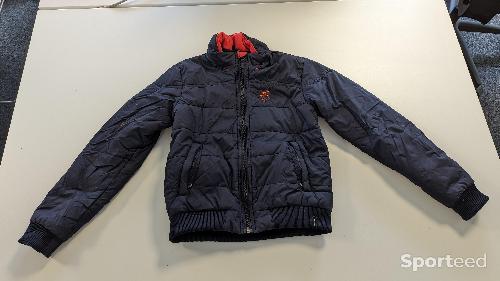 Doudoune bleue et rouge 10 ans