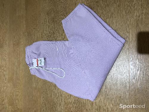 Sportswear - Jogging Nike Fleece Solo Swoosh mauve taille L - photo 6