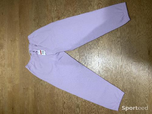 Sportswear - Jogging Nike Fleece Solo Swoosh mauve taille L - photo 6