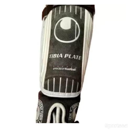 Protège tibias Plate