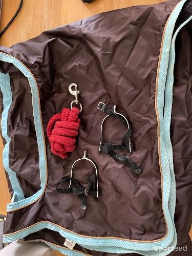 Couverture + éperon. + longe 