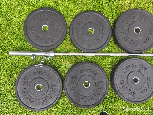 Musculation - Barre 20kgs + Poids olympiques 100kgs - photo 6