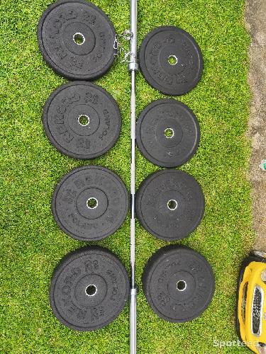 Musculation - Barre 20kgs + Poids olympiques 100kgs - photo 6