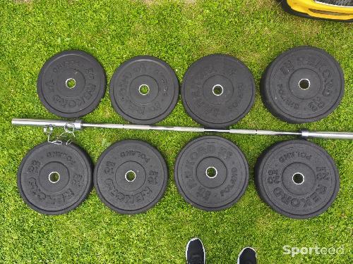 Musculation - Barre 20kgs + Poids olympiques 100kgs - photo 6