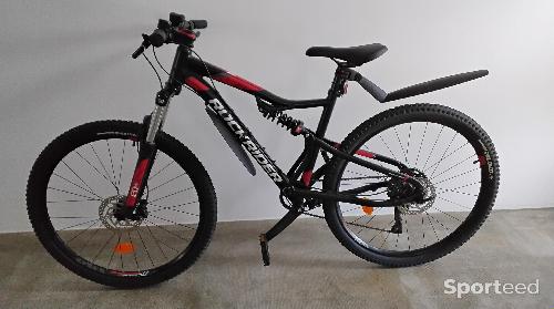 Vélo loisir / urbain - VTT ROCKRIDER ST 530 NOIR ROUGE  - photo 6