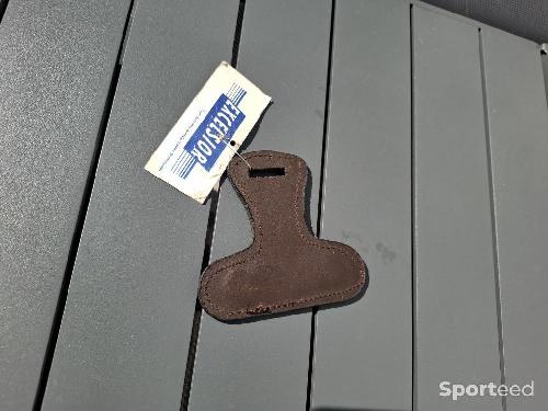 Attache de croupière