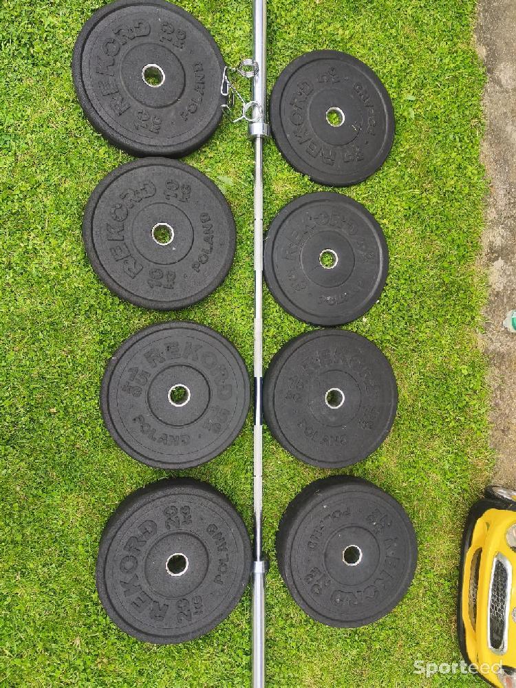 Musculation - Barre 20kgs + Poids olympiques 100kgs - photo 4