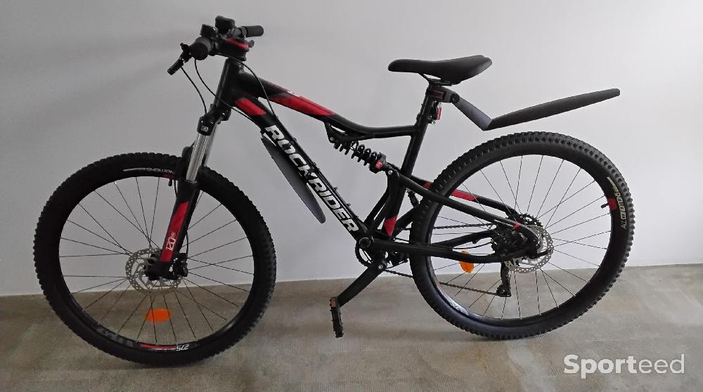 Vélo loisir / urbain - VTT ROCKRIDER ST 530 NOIR ROUGE  - photo 1