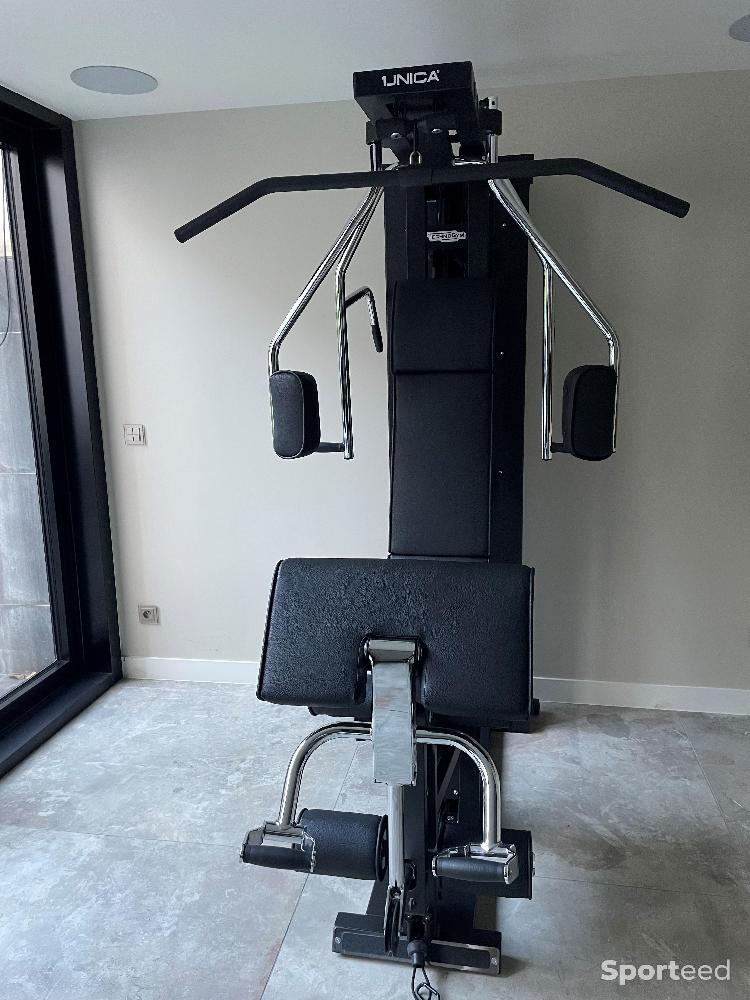 Musculation - banc de musculation multi fonctions Technogym  Unica M311 noir etat neuf - photo 1